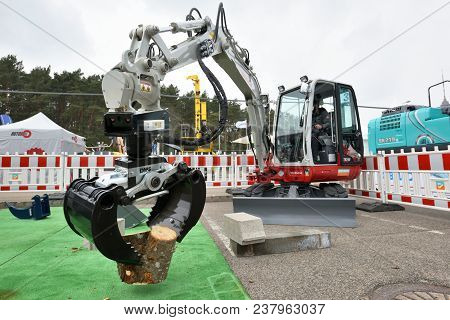 Vilnius, Lithuania - April 25: Takeuchi Excavator On April 25, 2018 In Vilnius Lithuania. Takeuchi M