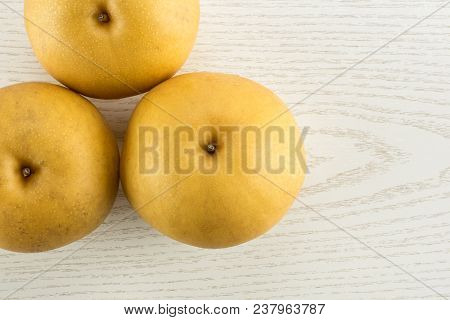 Chinese Golden Pears Top View Nashi Variety Isolated On White Wooden Background Three Whole Round