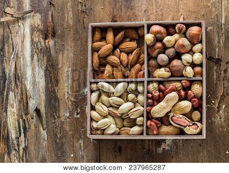 Arieties Of Nuts: Peanuts Hazelnuts Almonds Walnuts  Pistachio . Food And Cuisine. Copy Spase
