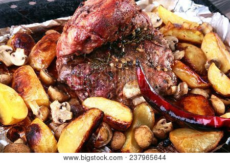 Grilled Pork Meat With Potatoes. Barbecue. Selective Focus