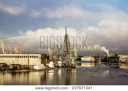 Saint-petersburg.russia.6 April 2018. Cranes  And Ships In The Marine Cargo Port Of Saint-petersburg