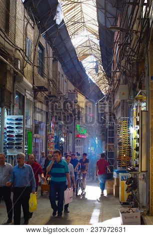 TEHRAN, IRAN - MAY 22, 2017: People at Tehran Grand Bazaar in Tehran, Iran. Grand Bazaar is the main market of Tehran