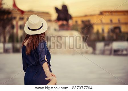 Woman In Center Of Tirana At Skanderbeg Square Follow Me Picture, Vintage Toning.
