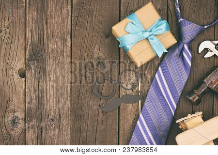 Fathers Day Side Border Of Gifts, Tie And Decor On A Rustic Wood Background. Top View, Vintage Styli