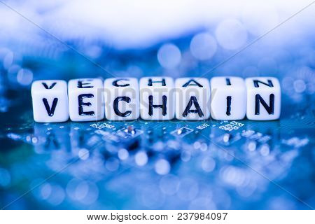 Word Vechain Formed By Alphabet Blocks On Mother Cryptocurrency Closeup