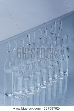 Glass Medical Ampoule Vial For Injection. Medicine Is Dry White Drug Penicillin Powder Or Liquid Wit