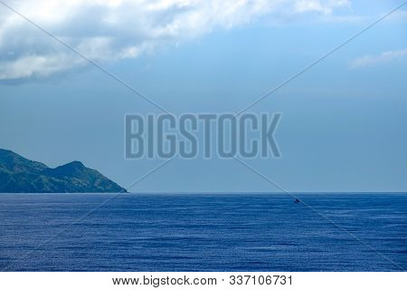Haiti-11/1/19: The Hazy And Mountainous Coastline Of The Caribbean Island Of Haiti As A Cruise Ship 