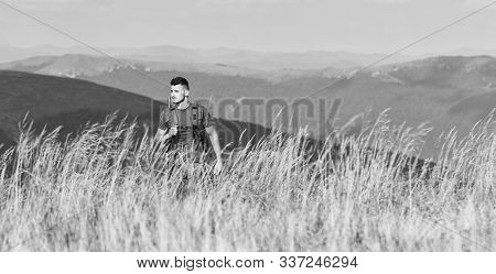 Battle Field. Man Ready To Fire. Hunter Hobby. Army Forces. Sniper Reach Target Mountain. Muscular M
