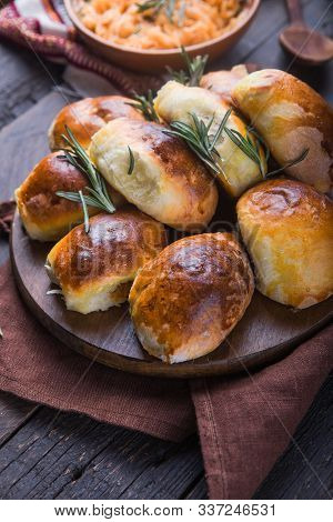 Ready-made Baked Pies With Cabbage.  Traditional Russian Cuisine. Dinner. Treats Family Traditions. 