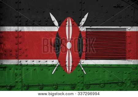 Kenya Flag Depicted On Side Part Of Military Armored Tank Closeup. Army Forces Conceptual Background