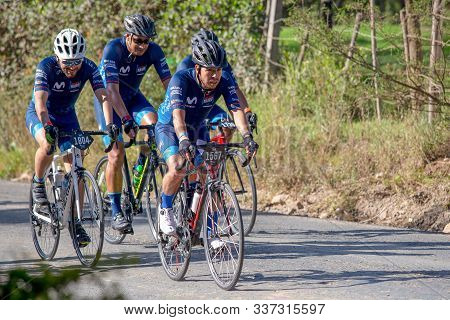 Villa De Leyva, Boyaca, Colombia - December 1, 2019:  Men And Women Of All Ages Ride Bicycles During