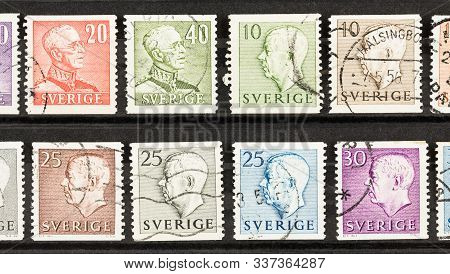 Seattle Washington - November 28, 2019: Rosw Of King Gustav V And Vi On Norwegian Postage Stamps.