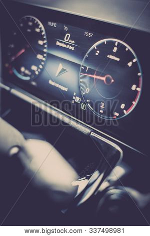 Close Up Shot With The Digital Tachometer On A Modern Car Dashboard.