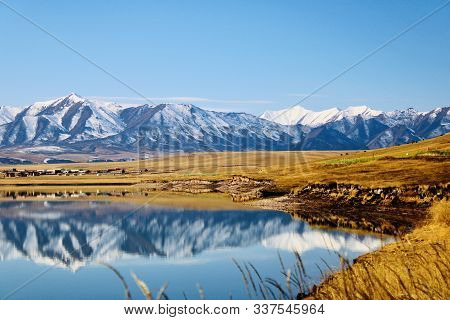 Qilian Snow Mountain Landscape Water Reflection Background