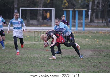 Odessa, Ukraine November 24, 2019: Local Rugby Clubs Engaged In Fierce Fight On Green Unequipped Fie