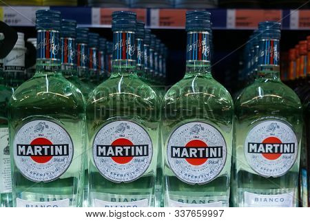 Tyumen, Russia-avg 25, 2019: Vermouth Martini Bianco On The Shelves Of The Hypermarket Metro Sale Of