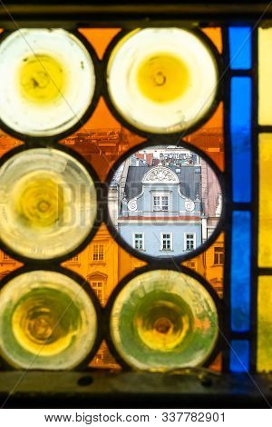 Panorama Of Krakow S Old Town Through The Colorful Stained Glass Window Of The Town Hall Tower. In T