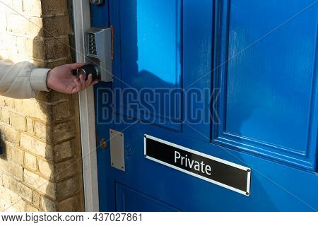 Private Room With Secure Code, Keyless Entry Lock Or Keypad Push Technology Door Lock. Human Hand Tr
