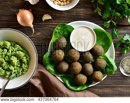 Falafel Balls. Deep Fried Balls From Ground Chickpeas On Plate Over Wooden Background. Top View, Fla
