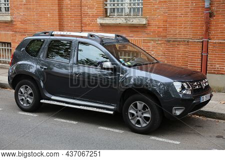 Toulouse, France - September 28, 2021: Dacia Duster Compact Crossover Suv Parked In A Street In Toul