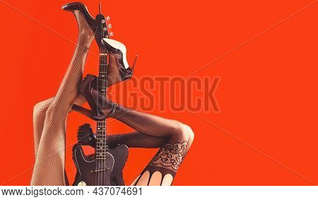 Music Concept. Sexy Legs. Guitar, Electric Guitar. Music Festival, Live Music, Concert. Instrument O