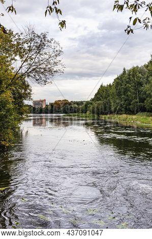 Zhabenka River Flows Into Bolshoi Akademicheskiy Pond In Moscow City On Cloudy Day
