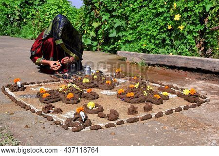 Beautiful Shape Or Artwork Made Of Cow Dung, Indian Rural Woman Worshiping, Govardhan Puja On Diwali
