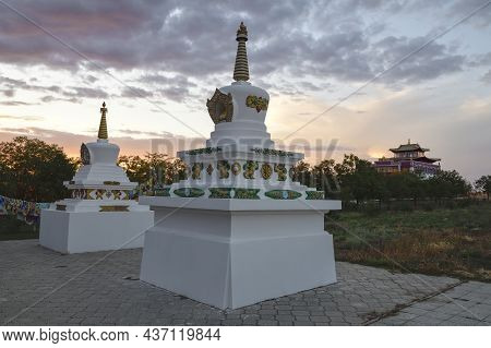 Stupas At The Syakyusn-syume Buddhist Temple Against The Backdrop Of A September Cloudy Sunset. Envi