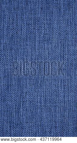Close-up Of Dark Blue Woven Surface. The Texture Of The Material Is Similar To Linen Or Denim. Abstr
