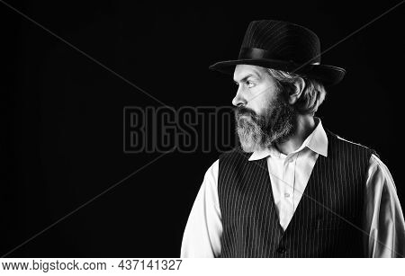 Man With Retro Hat. Brutal Bearded Hipster In Suit Vest. Mafia Gentlemen Club. Mature Cowboy. Detect