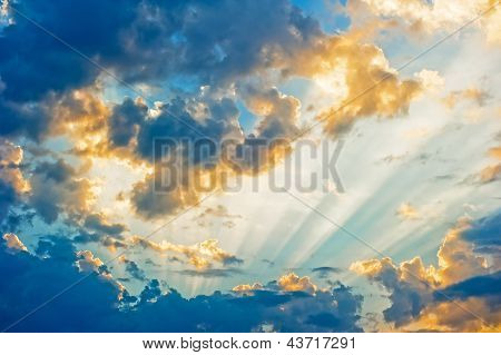Beautiful heavenly landscape with the sun in the clouds.