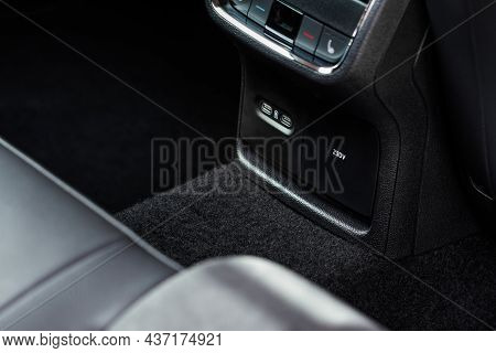 12v And 220v Power Outlet Socket In The Car. Closed Sockets.