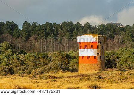 Saint Brelade British Round Coastal Defence Tower Standing In The Field, Bailiwick Of Jersey, Channe
