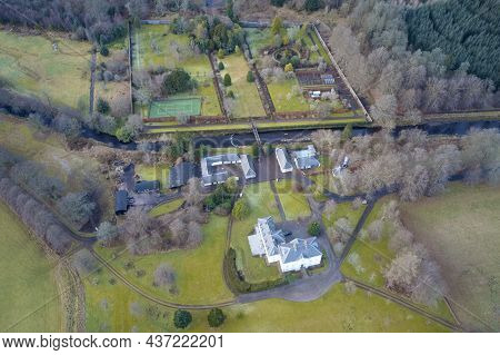 Mansion And Private Tennis Court In Real Estate Grounds Aerial View From Above