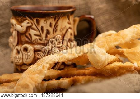 Fried Bread Sticks With Salt And A Ceramic Mug, Close-up, Selective Focus