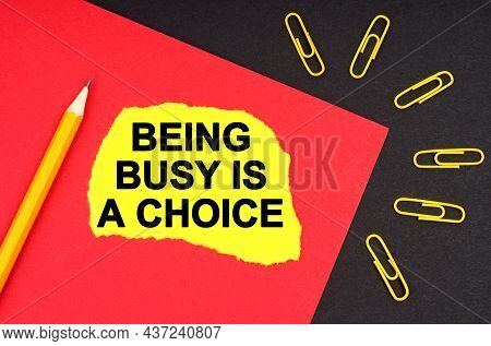 Business And Finance Concept. On A Black Background, There Are Yellow Paper Clips And A Sheet Of Pap