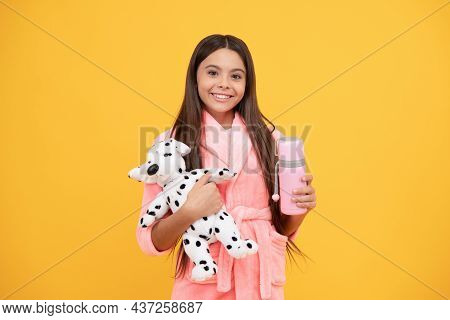 Good Morning. Kid Wear Soft Nightsuit Play With Toy. Child In Cozy Sleepwear. Skin Beauty.