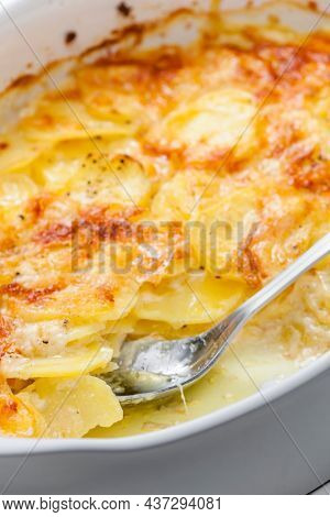 still ife of baked potatoes with cheese