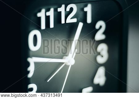 A Black Modern Watch With White Numbers On Which The Hands Move. The Transience Of Time. The Onset O