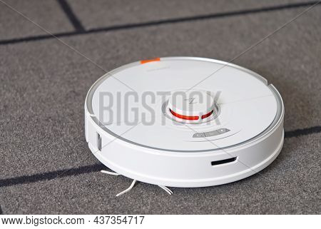 Tallinn, Estonia - October 10, 2021: Xiomi S7 Roborock Vacuum Cleaner Performs Automatic Cleaning Of