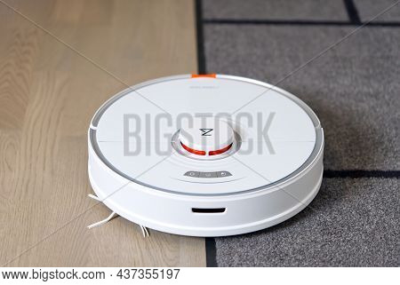Tallinn, Estonia - October 10, 2021: Xiomi S7 Roborock Vacuum Cleaner Performs Automatic Cleaning Of