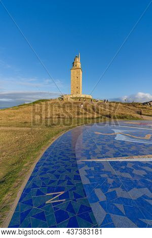 A Coruna, Spain, August 14, 2021. View Of The Tower Of Hercules In The City Of A Coruna, Galicia, Wi