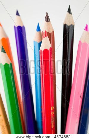 Colour pencils isolated on white background close up