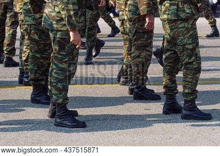 Greek Army Soldiers In Combat Uniform During Parade. Silhouette Of Hellenic Armed Forces Males Weari