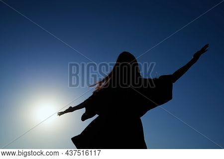 Silhouette Dance Of Beautiful Caucasian Elegant Girl In Dress Dancing During Sunset Or Woman Perform
