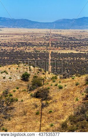Never Ending Fence Delimiting Properties From A Steppe Area In Order To Ban The Access From One To A
