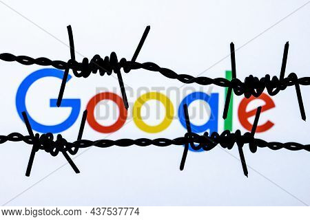 Kazan, Russia - Oct 26, 2021: Google Technology Company Logo Behind Barbed Wire. The Concept Of Goog