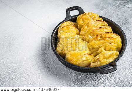 Baked Potato Gratin Dauphinois In A Pan. White Background. Top View. Copy Space