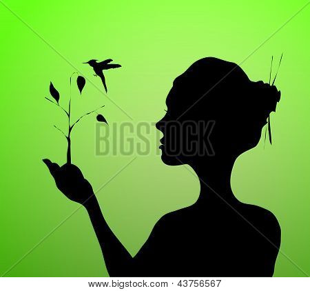 Tenendo la mano donna e piantare albero con uccello