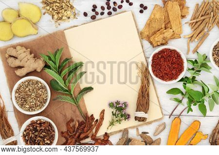 Herb and spice collection for immune system defence used in natural herbal medicine with hemp notebook Healthy food concept high in antioxidants, anthocyanins, vitamins and minerals.